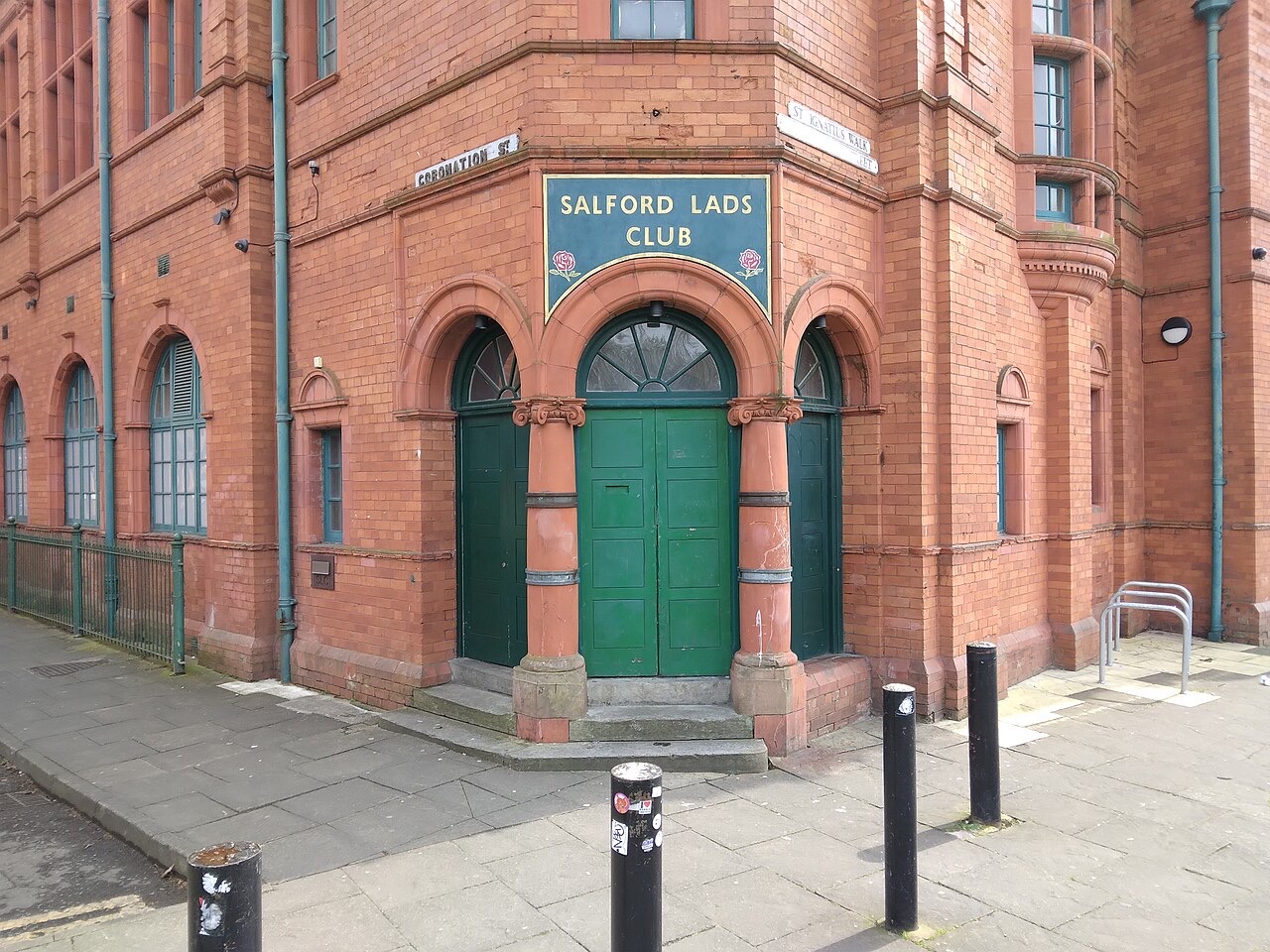 Salford Lads Club, a red-brick Edwardian building on a street corner in Ordsall